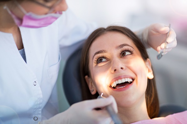 Smile Confidently Again: The Benefits Of Visiting A Restorative Dentist