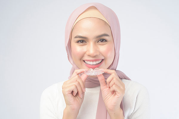 How Often Are Invisalign Retainers Changed During Teeth Straightening?