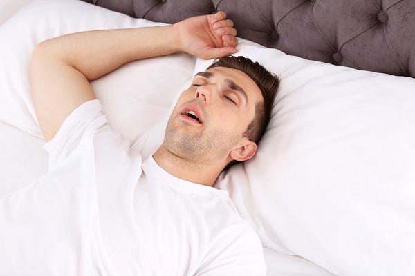 A Sleep Medicine Dentist Explains How Weight Loss Can Help With Sleep Apnea